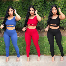 C8186 Wholesale womens 2 piece fall clothing sleeveless hollow out crop top stacked long pants yoga jogging outfit ladies sets